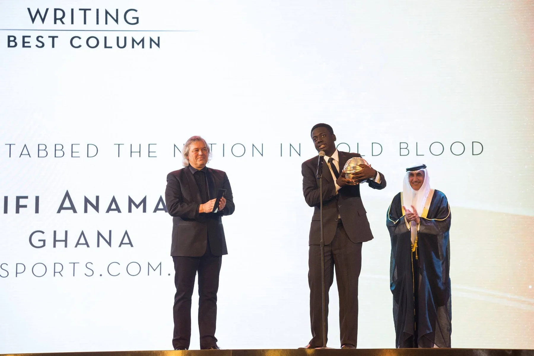 Fiifi Anaman receiving the Best Writing — Column award at the 2015 Sport Media Pearl Awards in Abu Dhabi